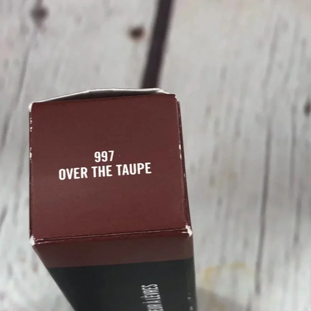 New in box MAC powder kiss liquid lipcoulour 997 over the taupe